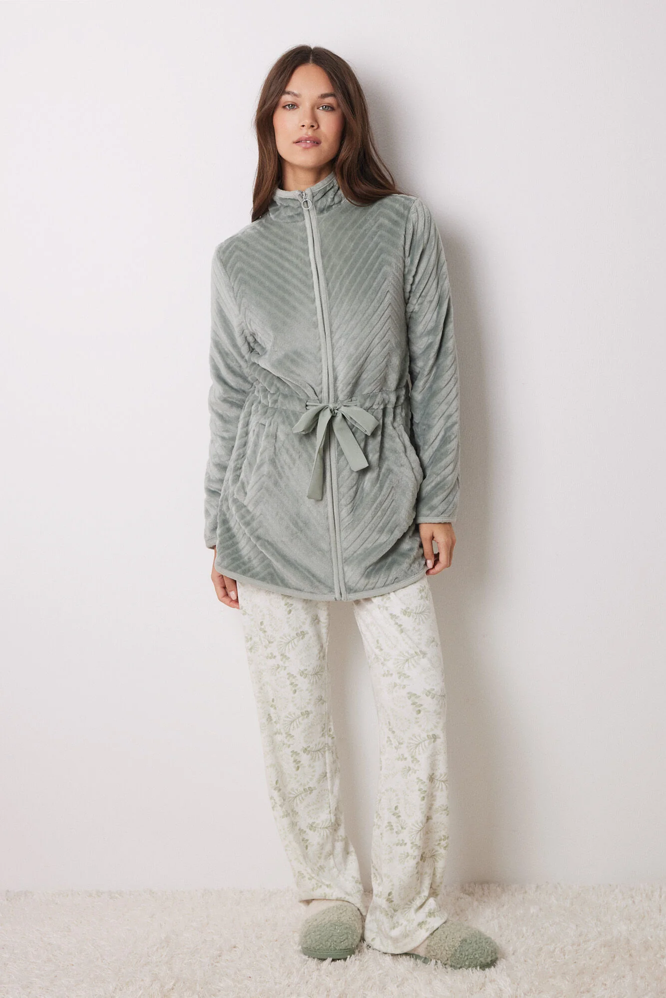 Long fluffy green zip fastening