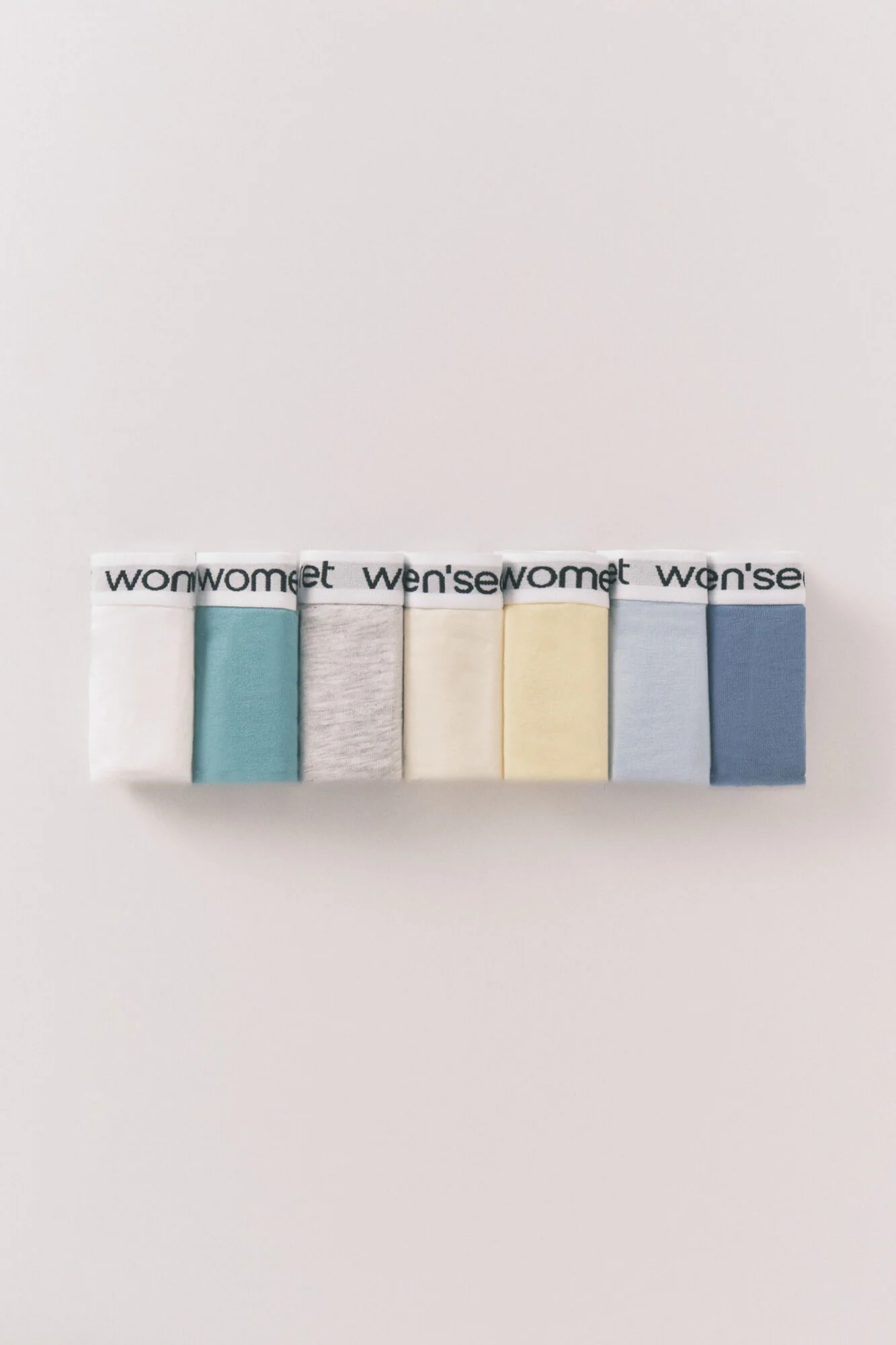Pack of 7 cotton thongs with white logo - Image 2